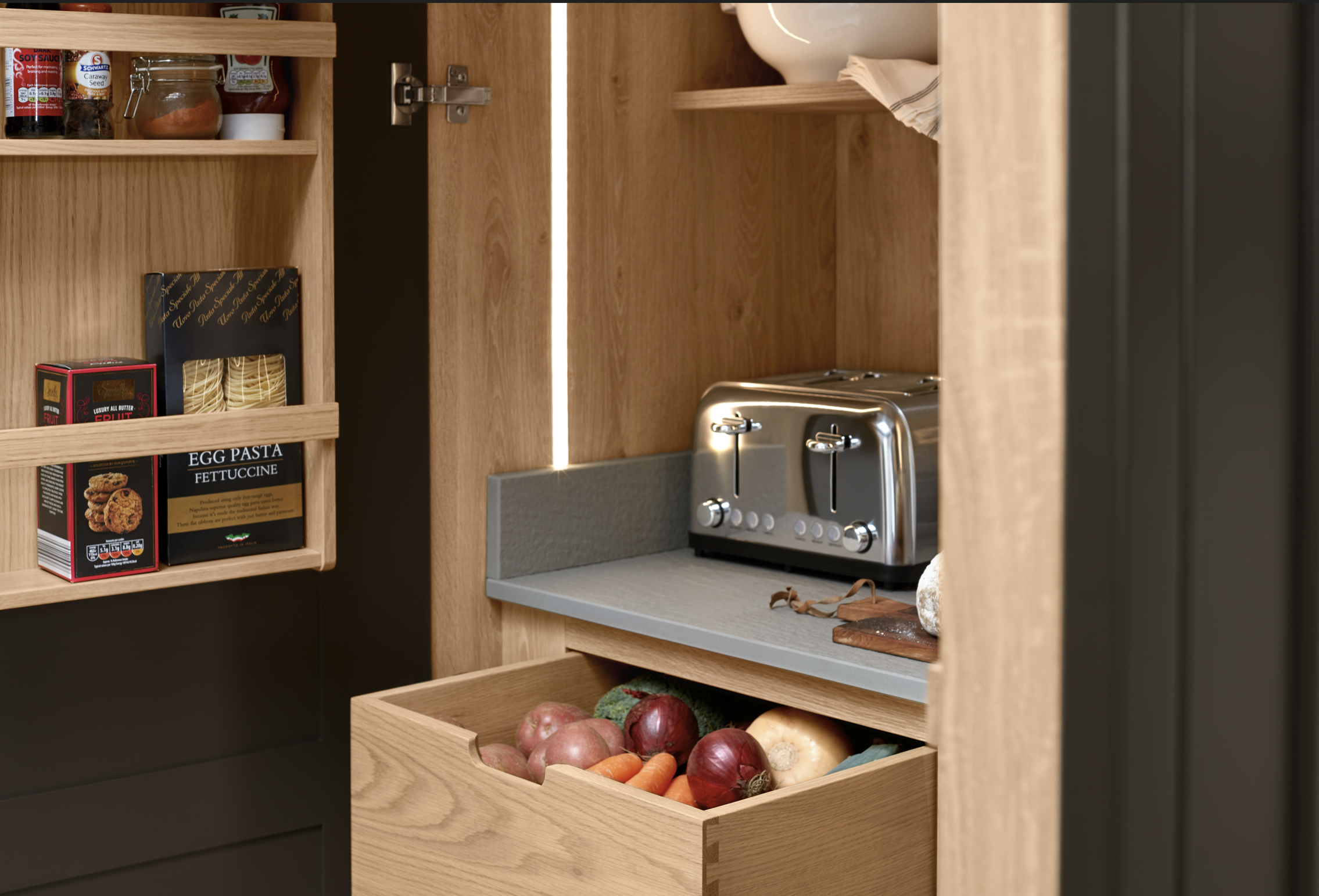 Kitchen larder with hidden appliances