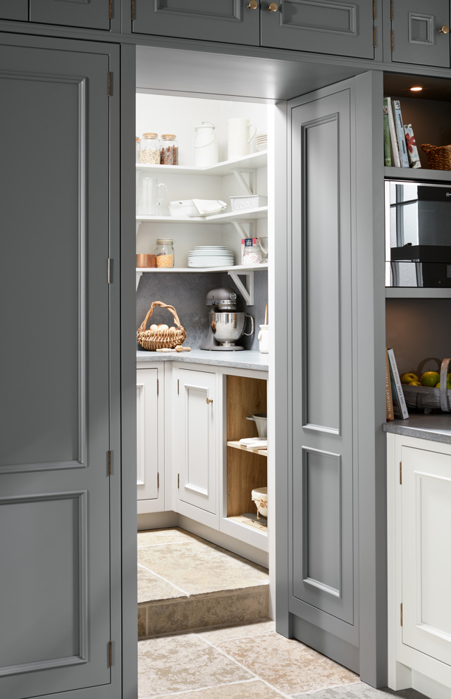 kitchen pantry with cabinets inside